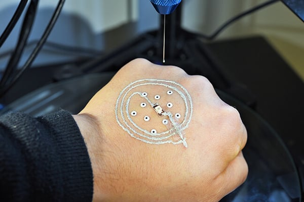 A New 3-D Printer System Can Print Electronics and Cells Directly on Your Skin